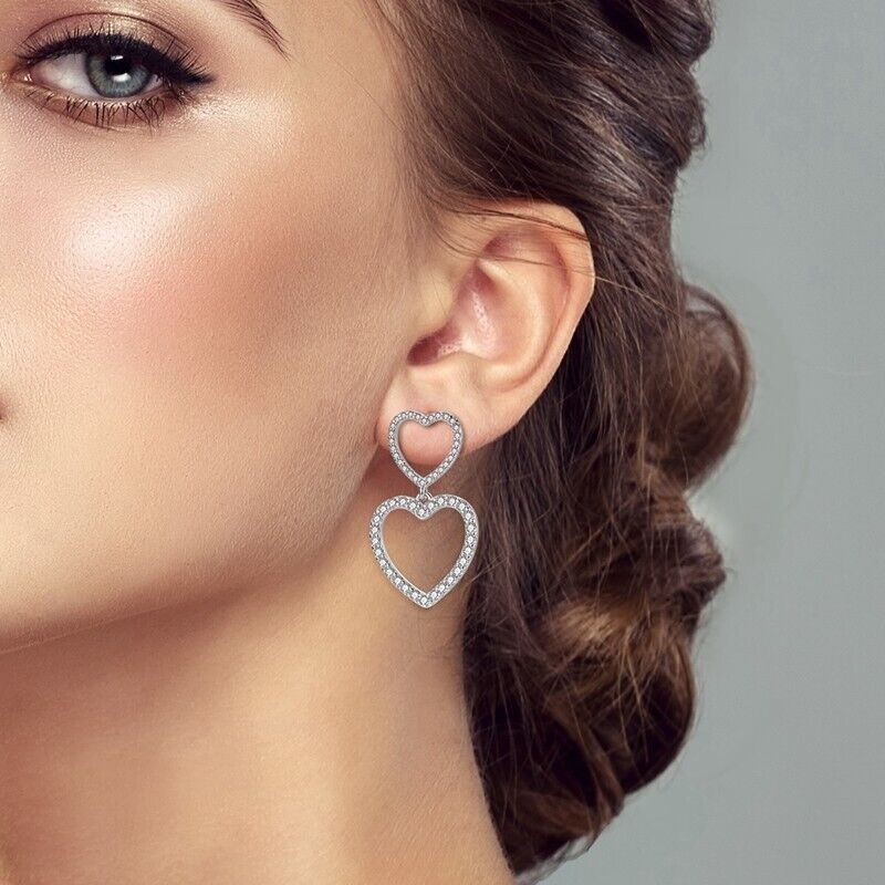 Sparkling Zirconia Two Dangle Hearts Stud Earrings