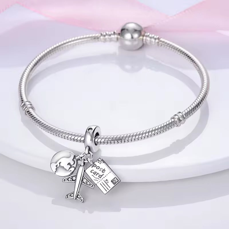 Globe & Plane Letter Dangle Charm