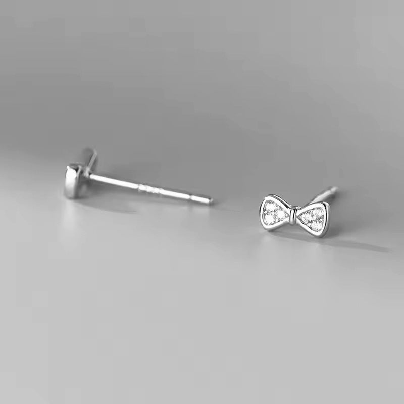 Sparkling Zirconia Bow Stud Earrings