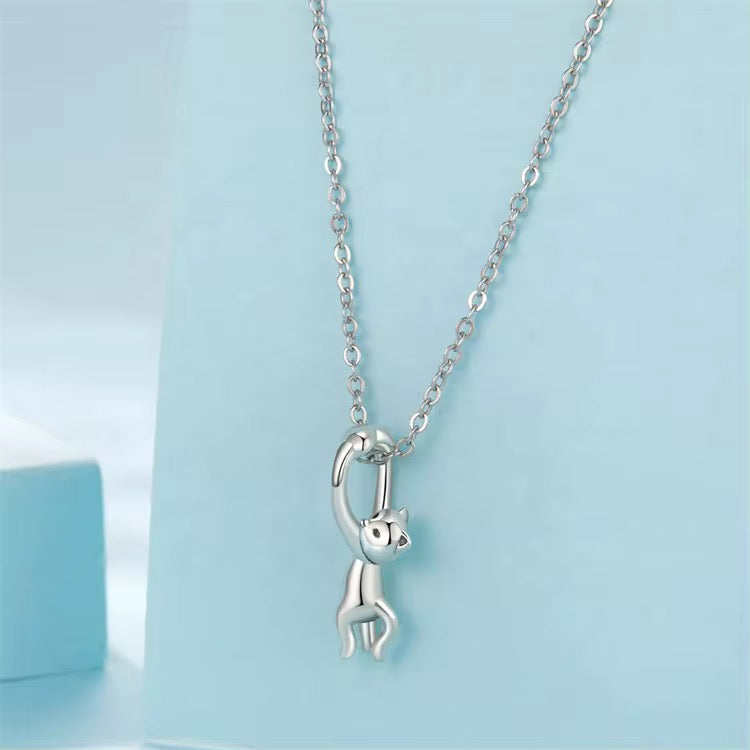 Cat Hugging a Bracelet Charm