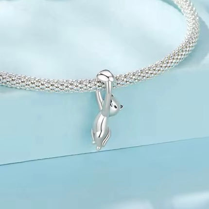 Cat Hugging a Bracelet Charm
