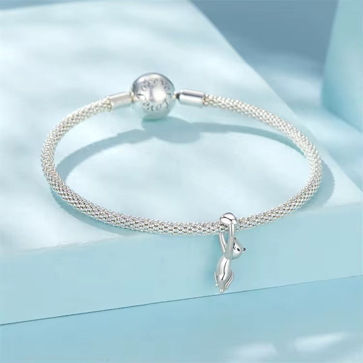 Cat Hugging a Bracelet Charm