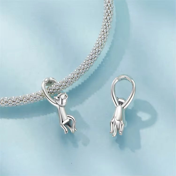 Cat Hugging a Bracelet Charm