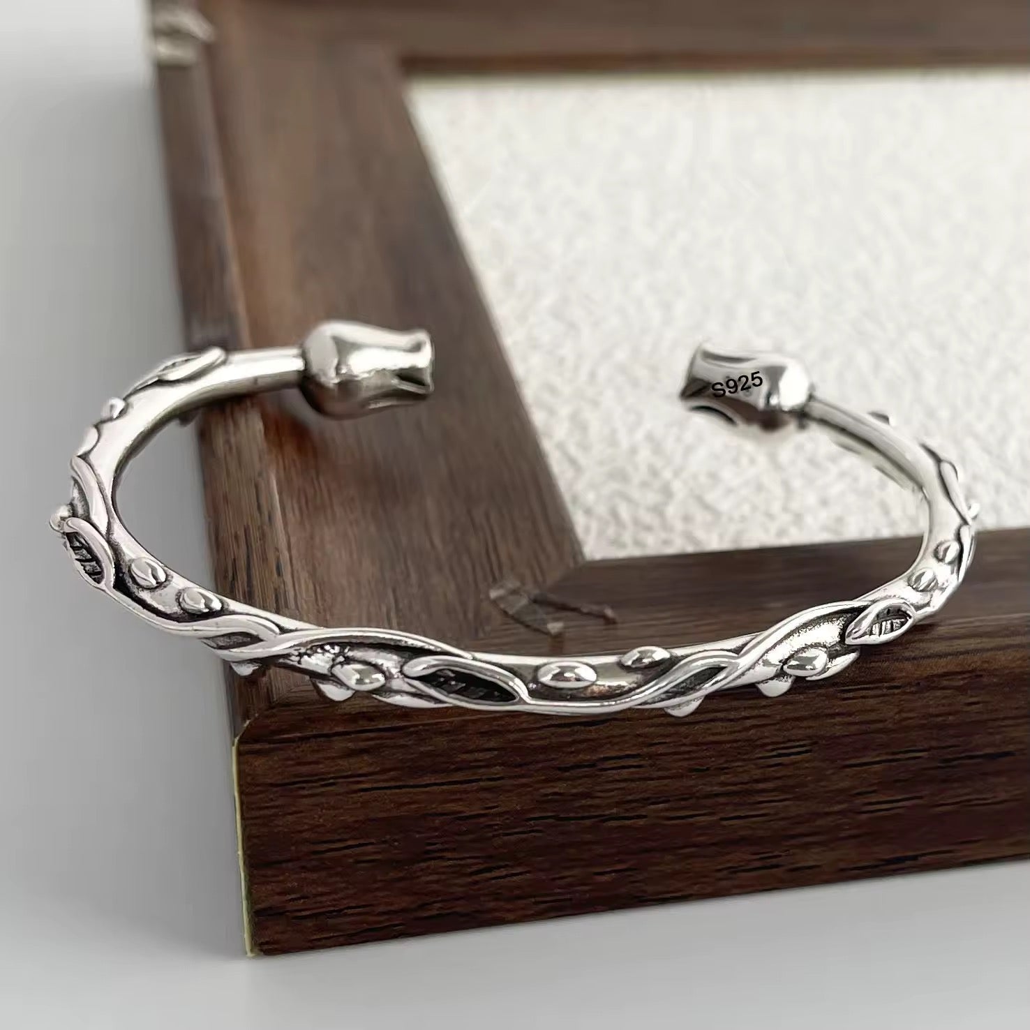 Silver Bracelet with Rose Ends