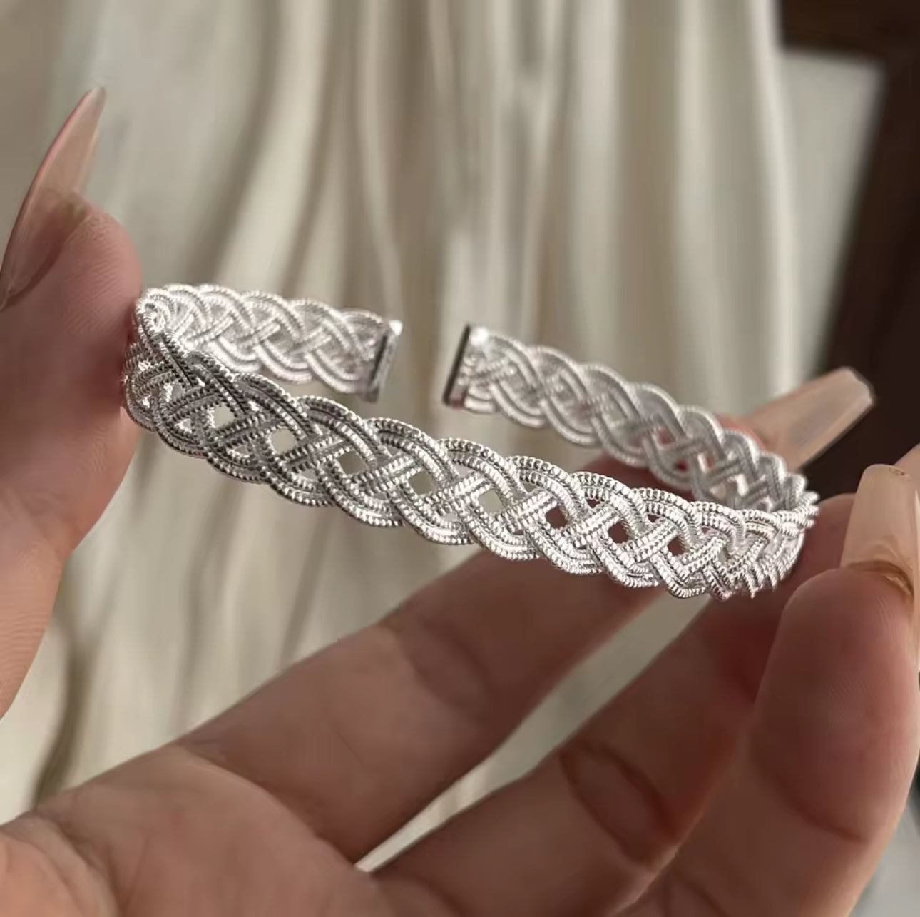 Celtic knot-style silver bracelet