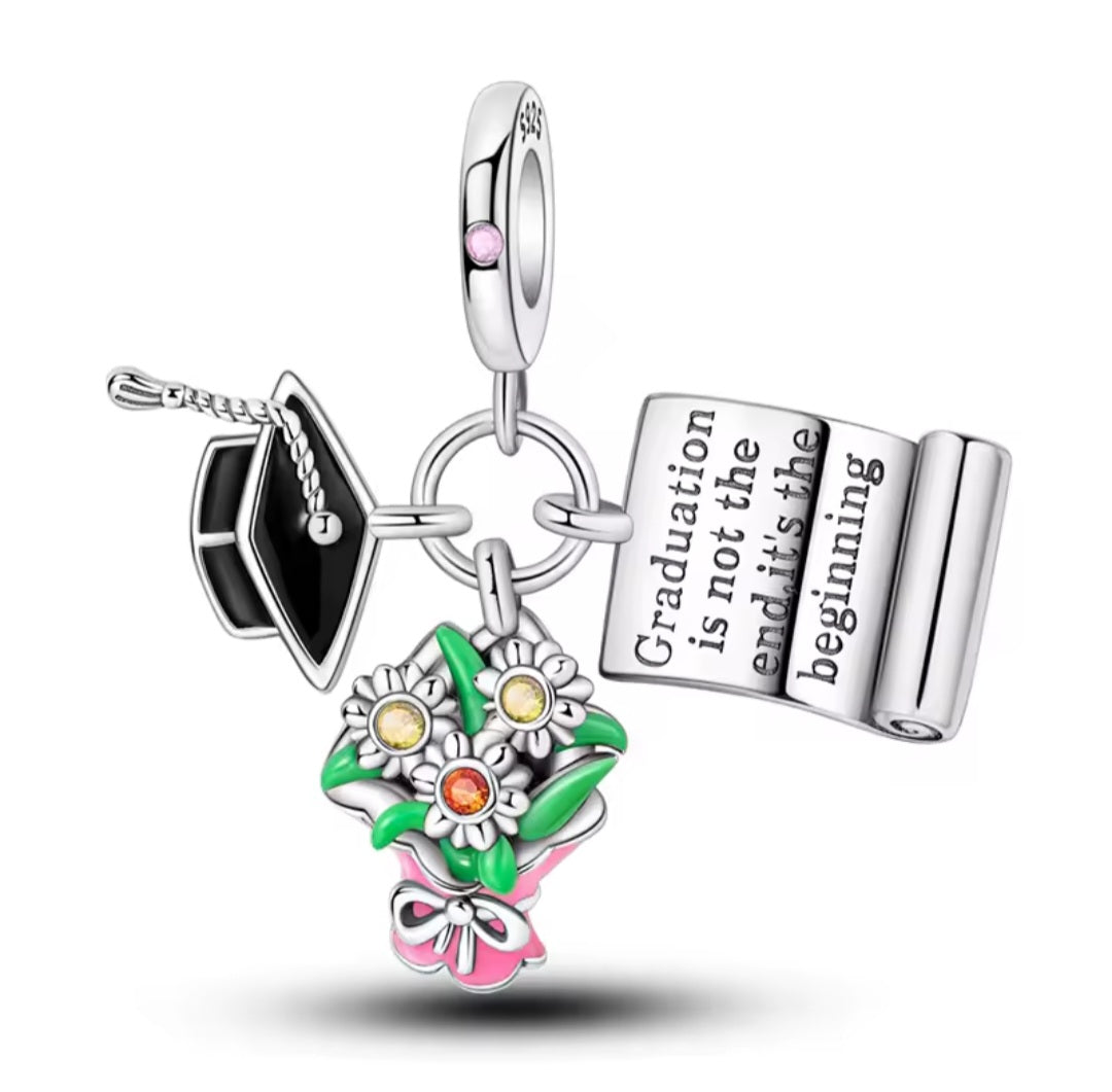 Silver graduation charm with cap, flowers, pink accents and engraved scroll pendant