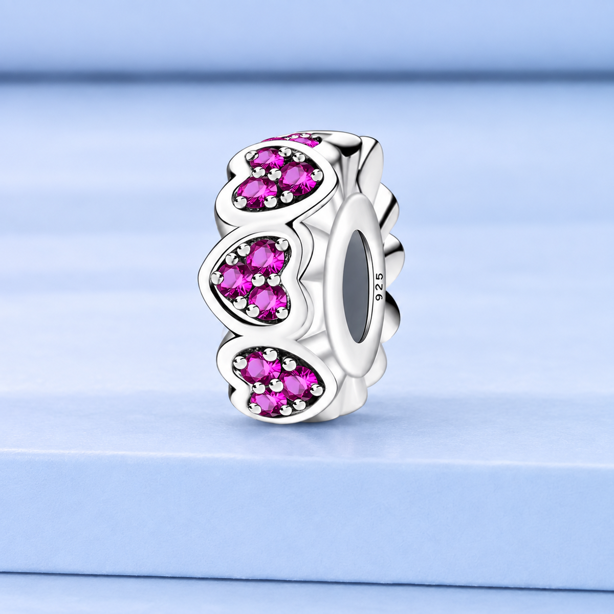 925 sterling silver heart charm with sparkling pink stones and open bead design