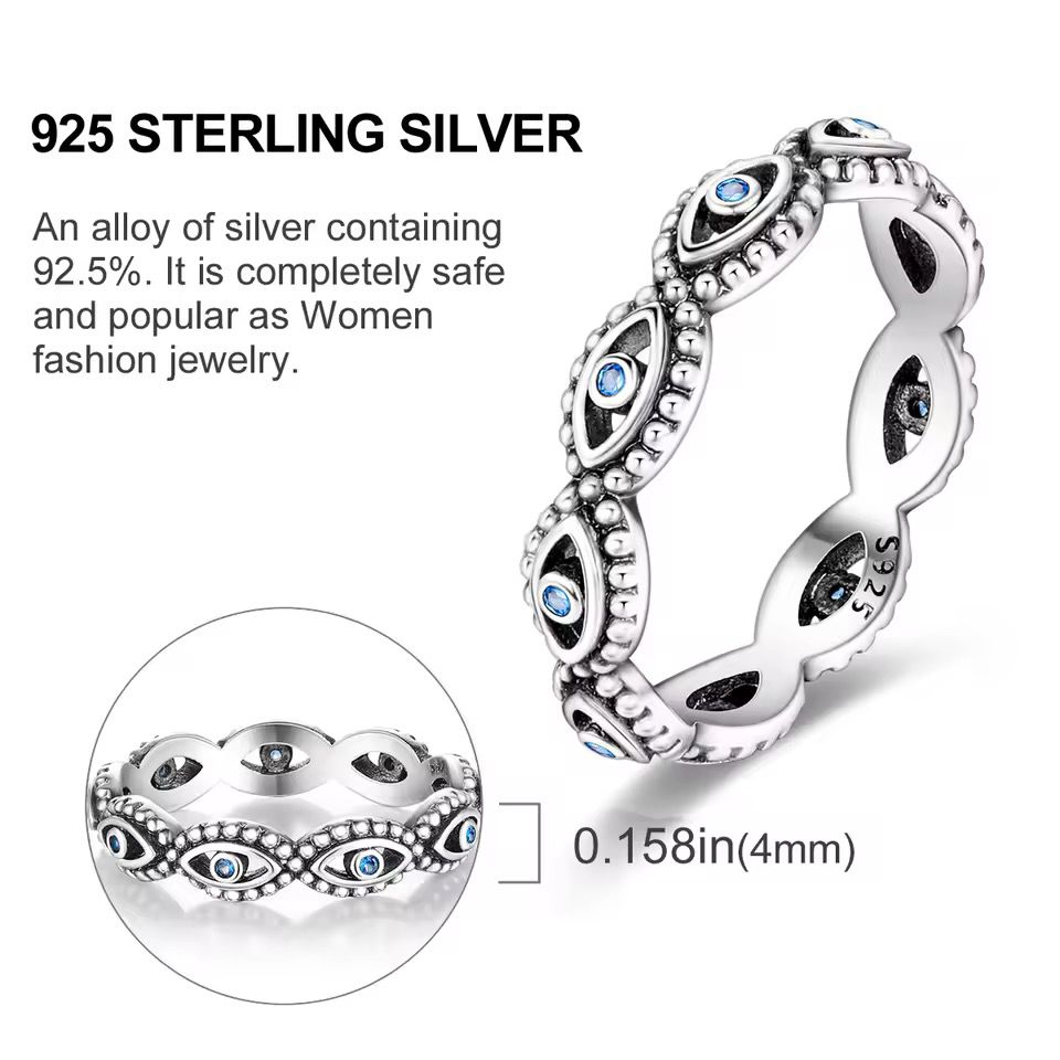 Sterling silver evil eye ring with blue crystal accents and beaded detailing