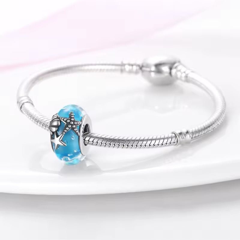 Blue Murano Glass with Shell and Starfish Charm - bellissi