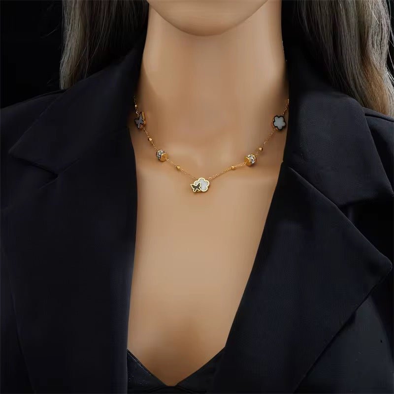 Butterfly on Flower Tassel Necklace - bellissi
