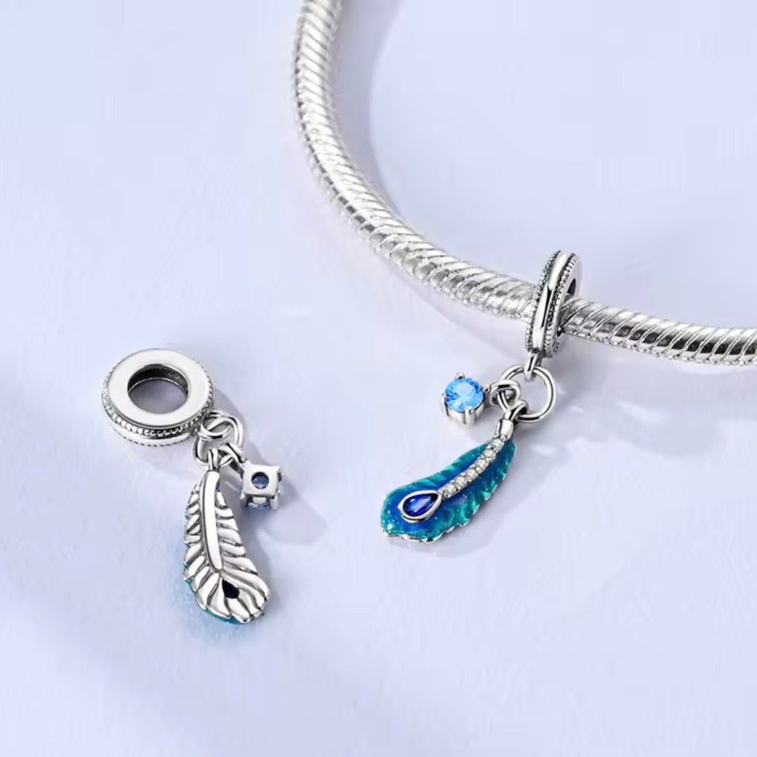 Silver Blue Feather Charm with Crystal Heart - bellissi