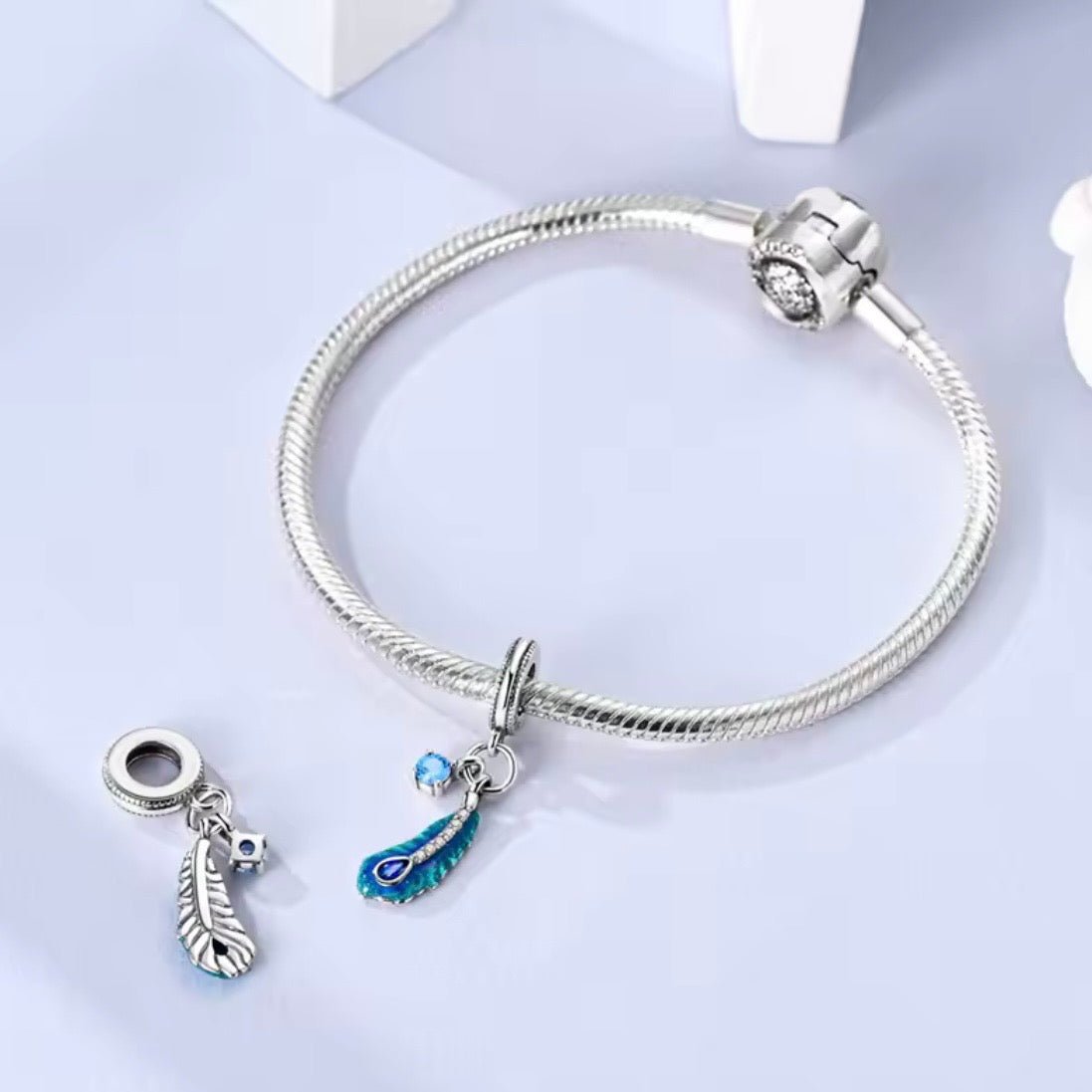 Silver Blue Feather Charm with Crystal Heart - bellissi