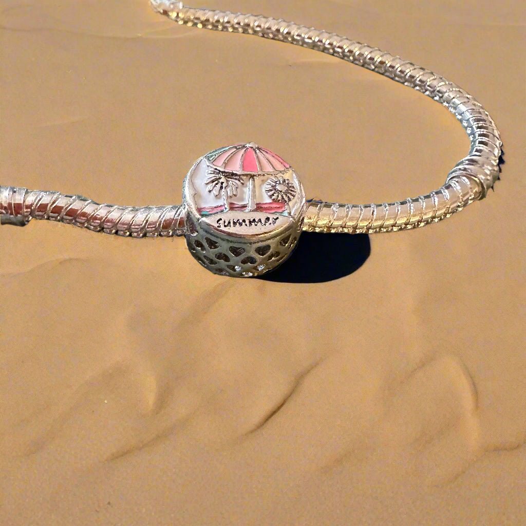 Summer palm tree charm with green enamel leaves and silver trunk