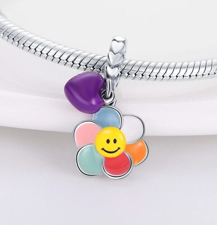 Multicoloured Flower With Heart Charm