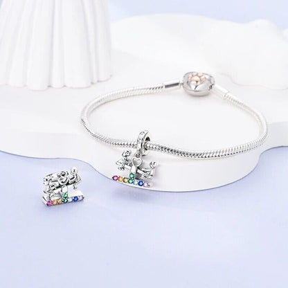 Boy With Girl on Swing and Zirconia Charm