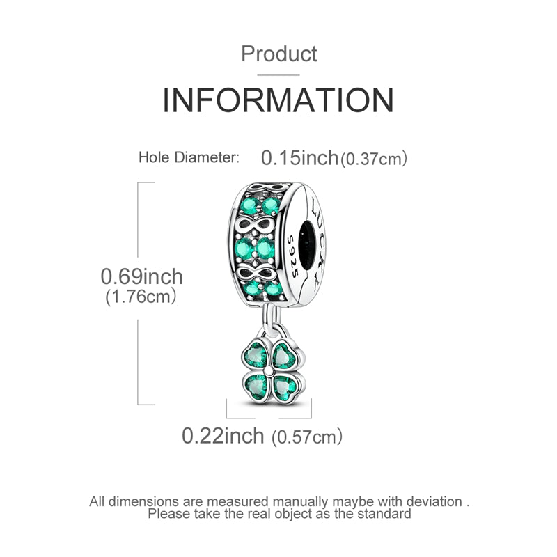 Silver clip-on charm with green crystals, infinity symbols and dangling four-leaf clover