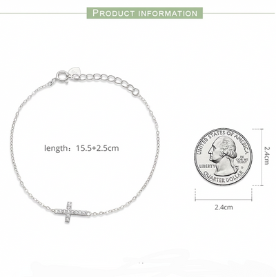 Dainty silver cross bracelet with sparkling crystals on wrist, minimalist adjustable chain jewelry