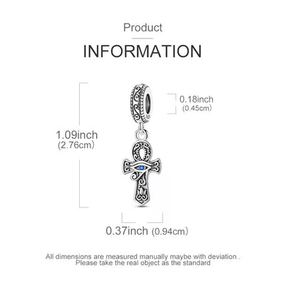 Product information diagram showing a silver-toned cross charm pendant with an evil eye detail, with dimensions labeled as 1.09 inches (2.