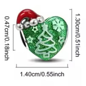 Heart-shaped ornament with Santa hat and Christmas tree design, shown with measurements.