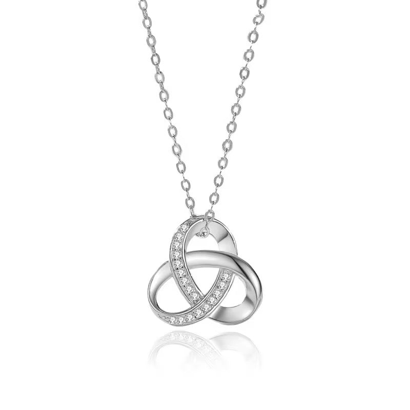 Silver Celtic inspired knot necklace with crystal accents on delicate chain