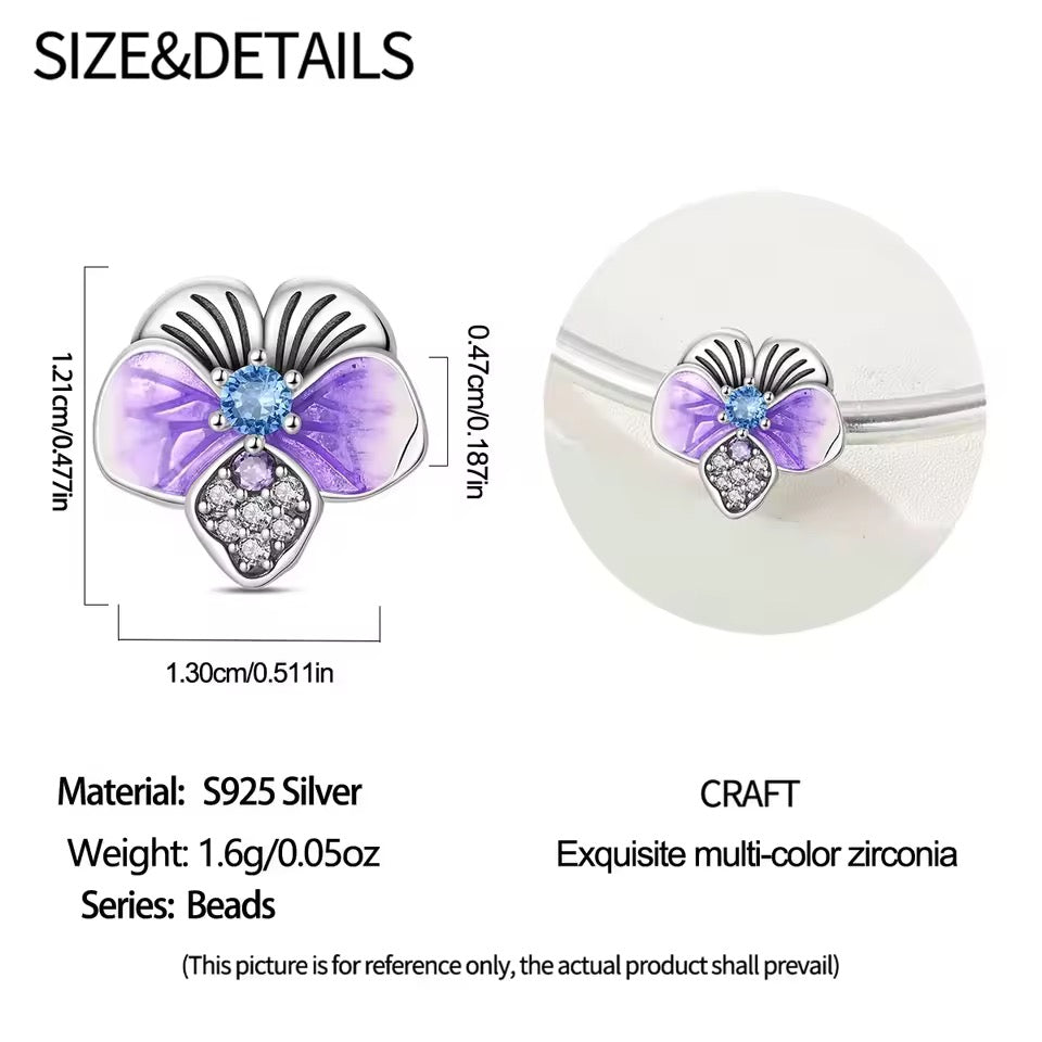 Silver butterfly charm with purple enamel wings and crystal details for charm bracelet