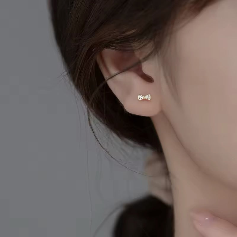 Sparkling Zirconia Bow Stud Earrings