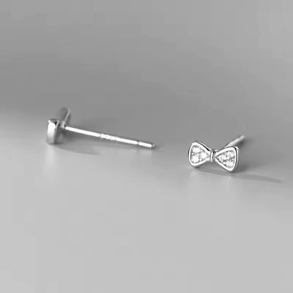 Sparkling Zirconia Bow Stud Earrings