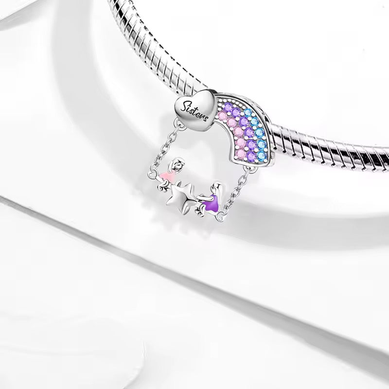 Sisters On Star Dangle Charm