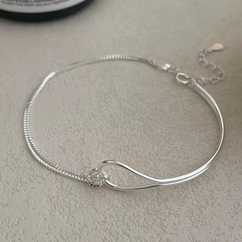Infinity curve bracelet minimalist elegant jewelry for women simple modern wrist accessory everyday style