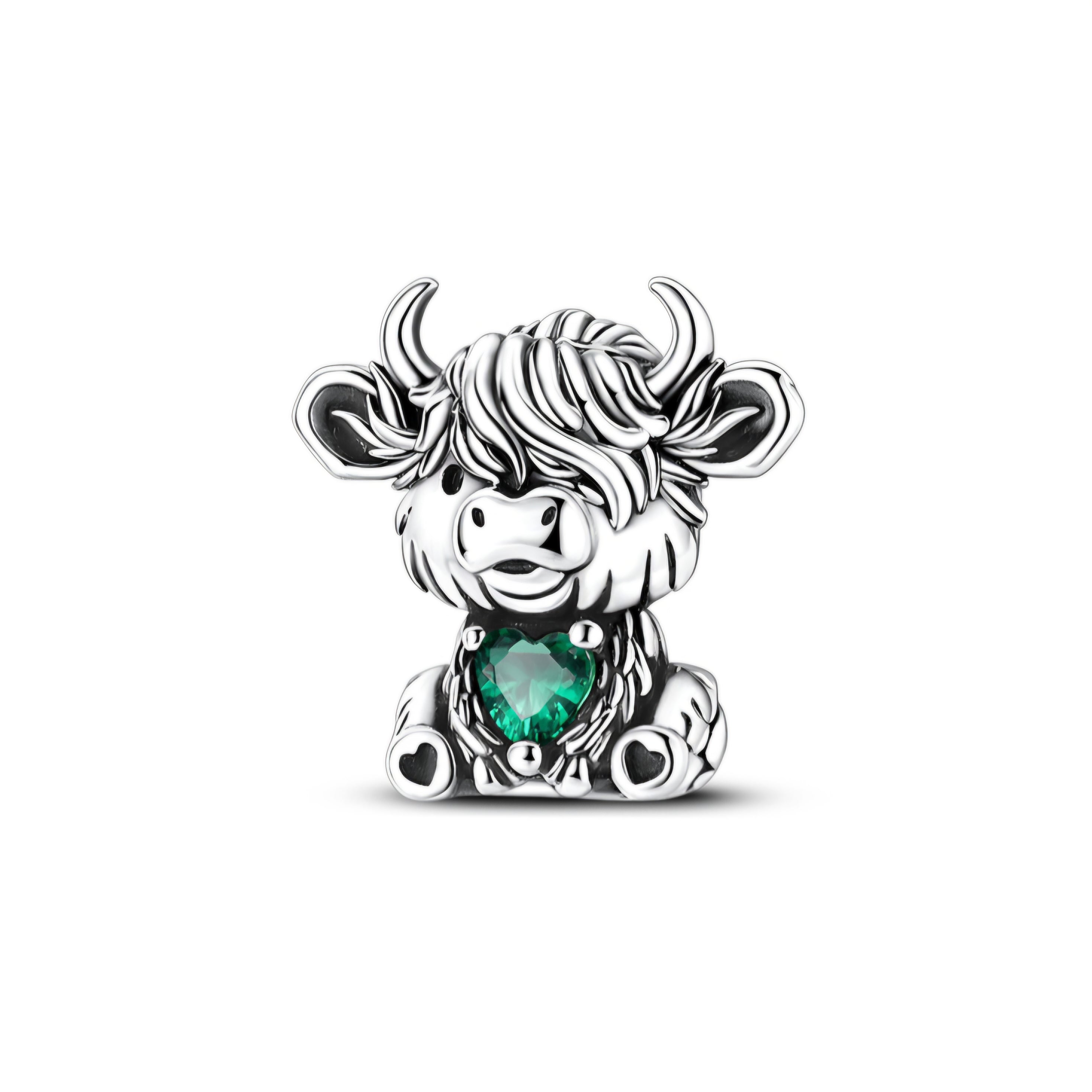 Silver Highland cow charm with emerald green heart crystal and detailed fur design