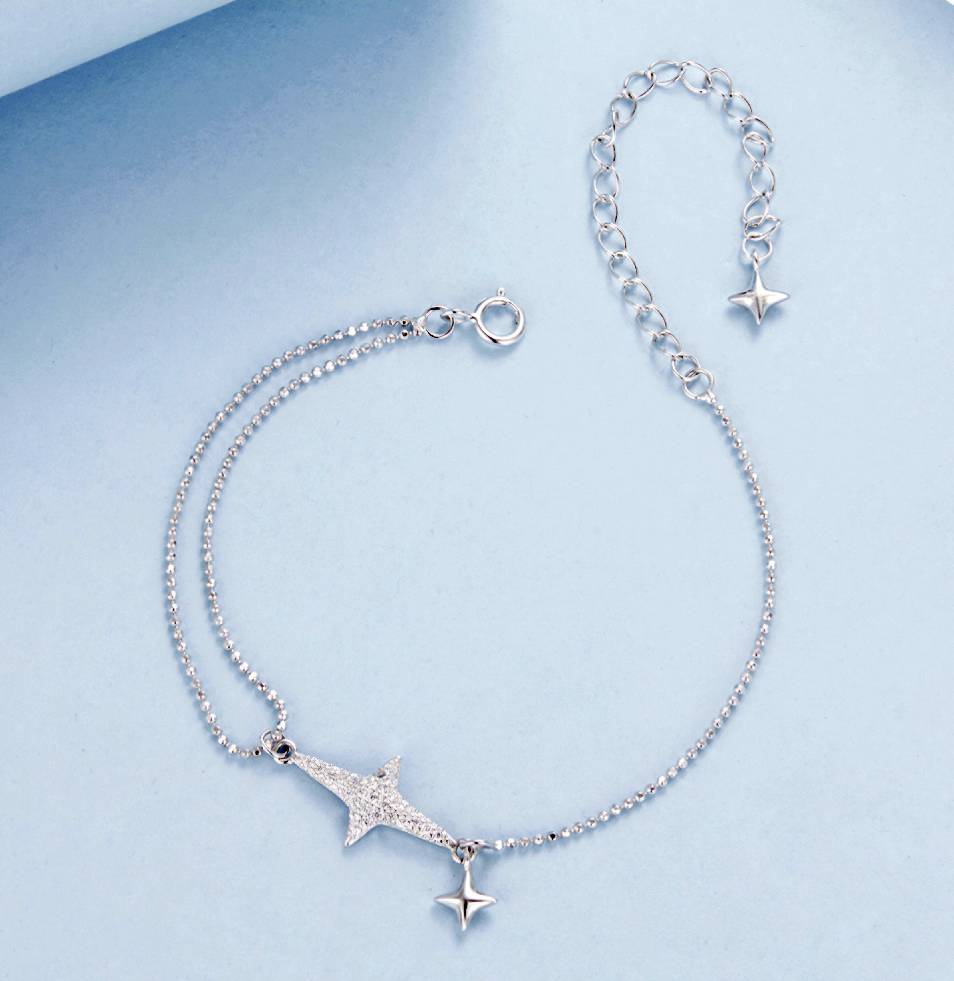 925 sterling silver double chain bracelet with sparkling star centerpiece and small dangling star charm