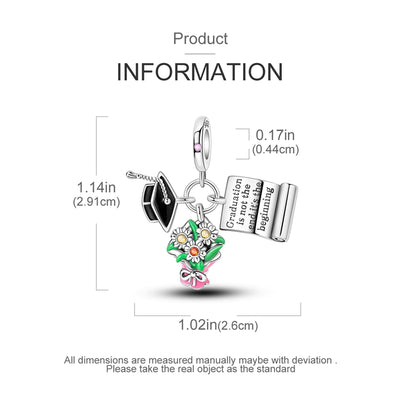 Silver graduation charm with cap, flowers, pink accents and engraved scroll pendant