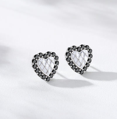 Silver heart stud earrings with black crystal border and white quilted center
