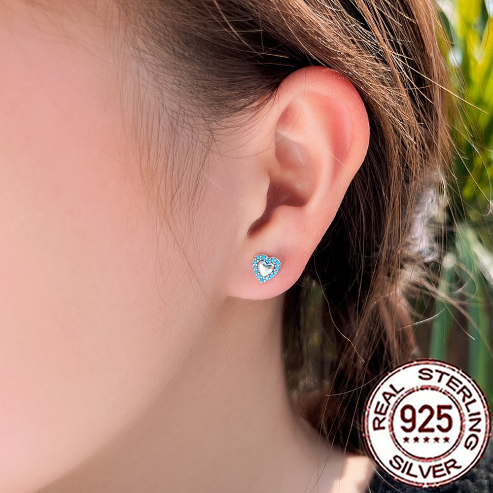 Silver heart stud earrings with turquoise stone detailing