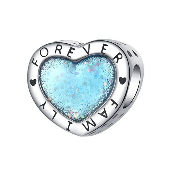 Silver heart charm with blue glitter center engraved with Forever Family and small heart details