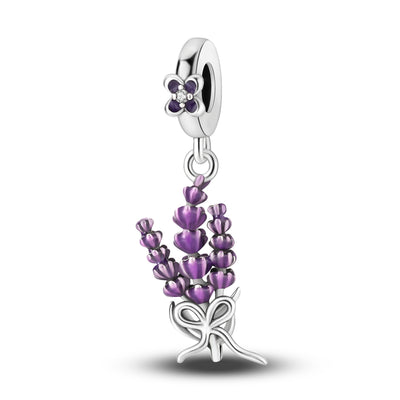 Sterling silver lavender flower dangle charm with purple enamel petals and crystal detail.