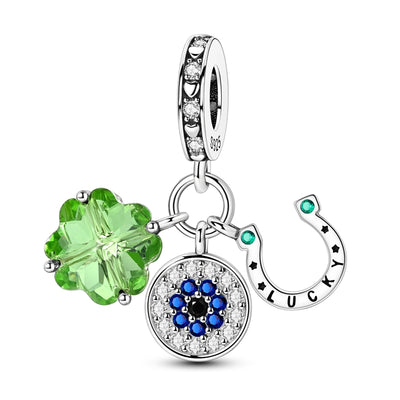 Sterling silver lucky charm with green crystal clover, evil eye pendant, and horseshoe detail