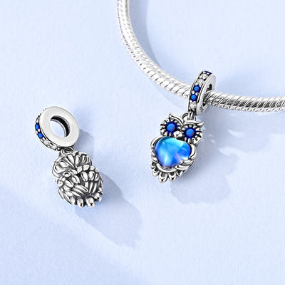 925 sterling silver owl charm with blue crystal eyes and glowing blue heart pendant