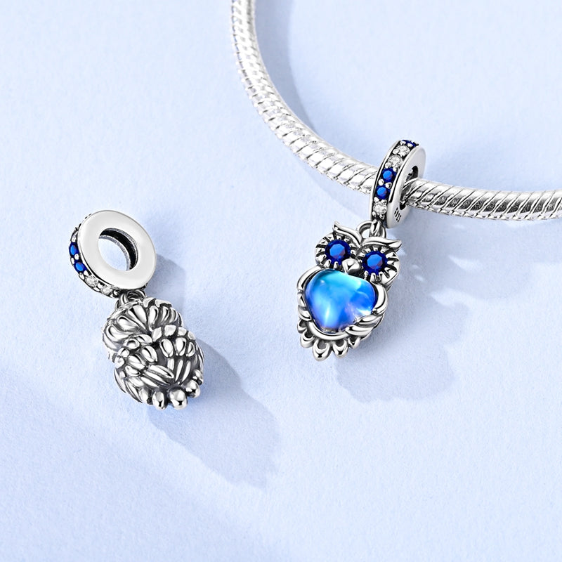 925 sterling silver owl charm with blue crystal eyes and glowing blue heart pendant