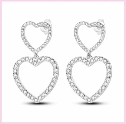 Sparkling Zirconia Two Dangle Hearts Stud Earrings
