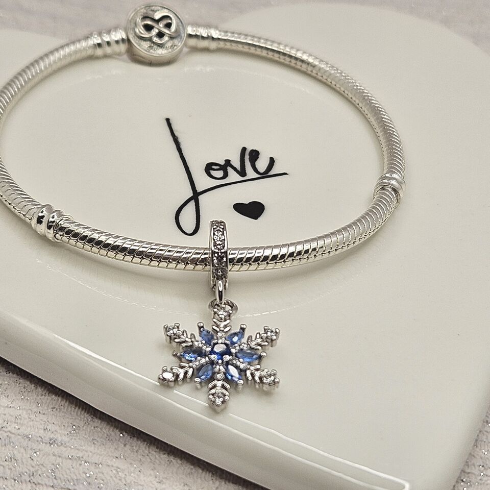 Sparkling snowflake dangle charm 925 sterling silver with blue and clear zirconia winter jewelry gift