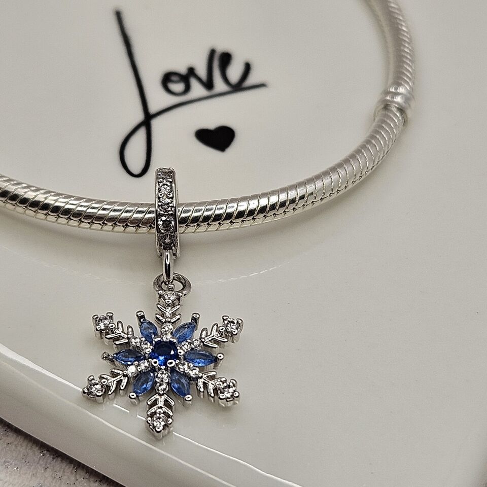 Sparkling snowflake dangle charm 925 sterling silver with blue and clear zirconia winter jewelry gift