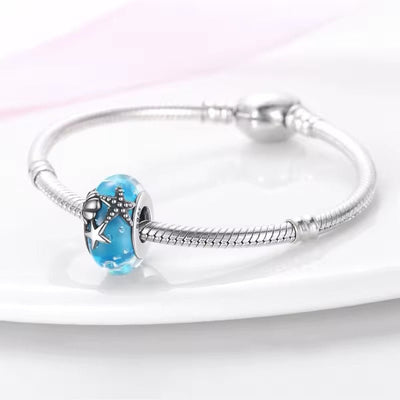 Blue Murano Glass with Shell and Starfish Charm - bellissi