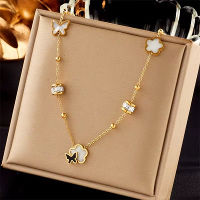Butterfly on Flower Tassel Necklace - bellissi