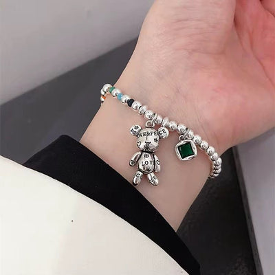 Cute Teddy Charm Bracelet with Green Gem - bellissi