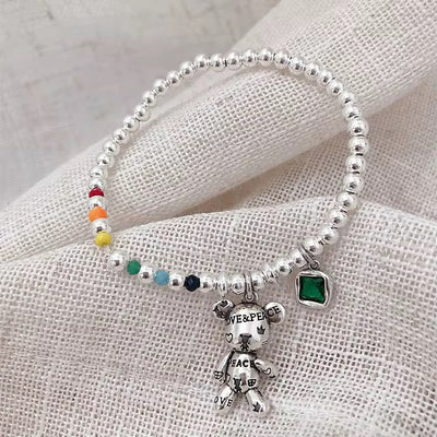 Cute Teddy Charm Bracelet with Green Gem - bellissi