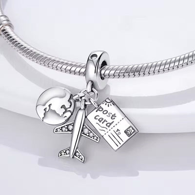 Globe & Plane Letter Dangle Charm - bellissi