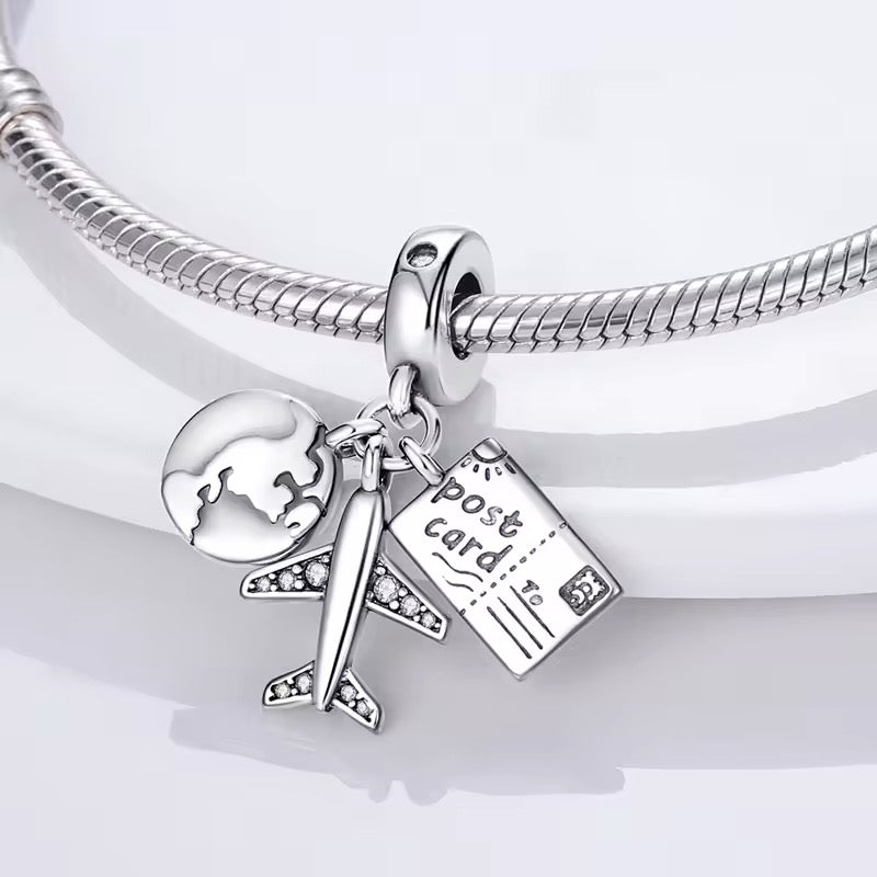 Globe & Plane Letter Dangle Charm - bellissi