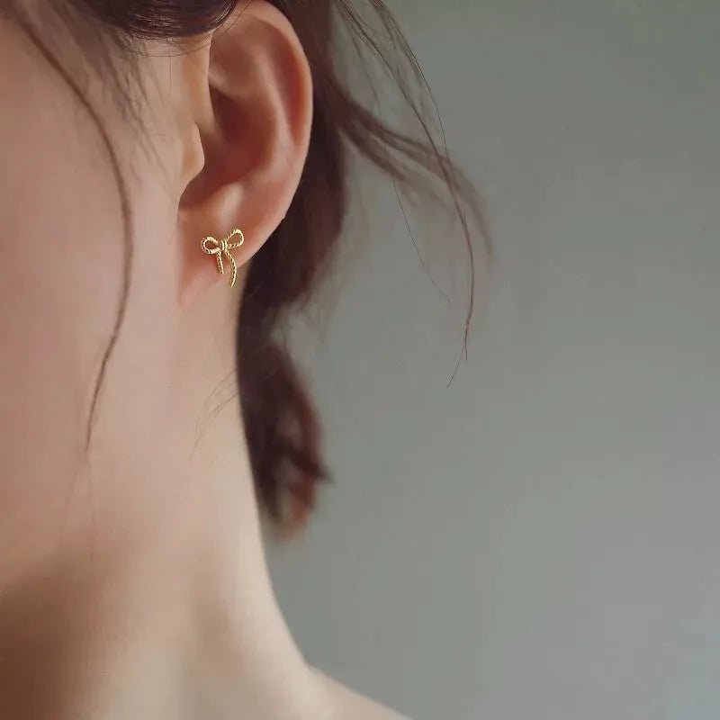 Gold Plated Bow Stud Earrings - bellissi