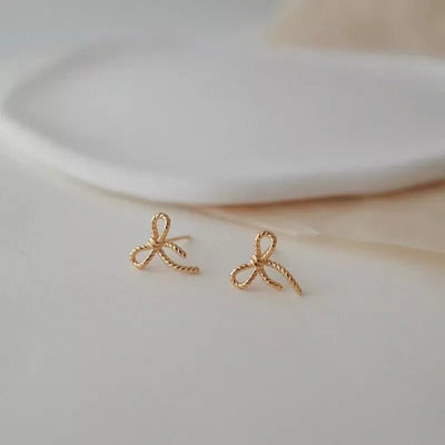 Gold Plated Bow Stud Earrings - bellissi